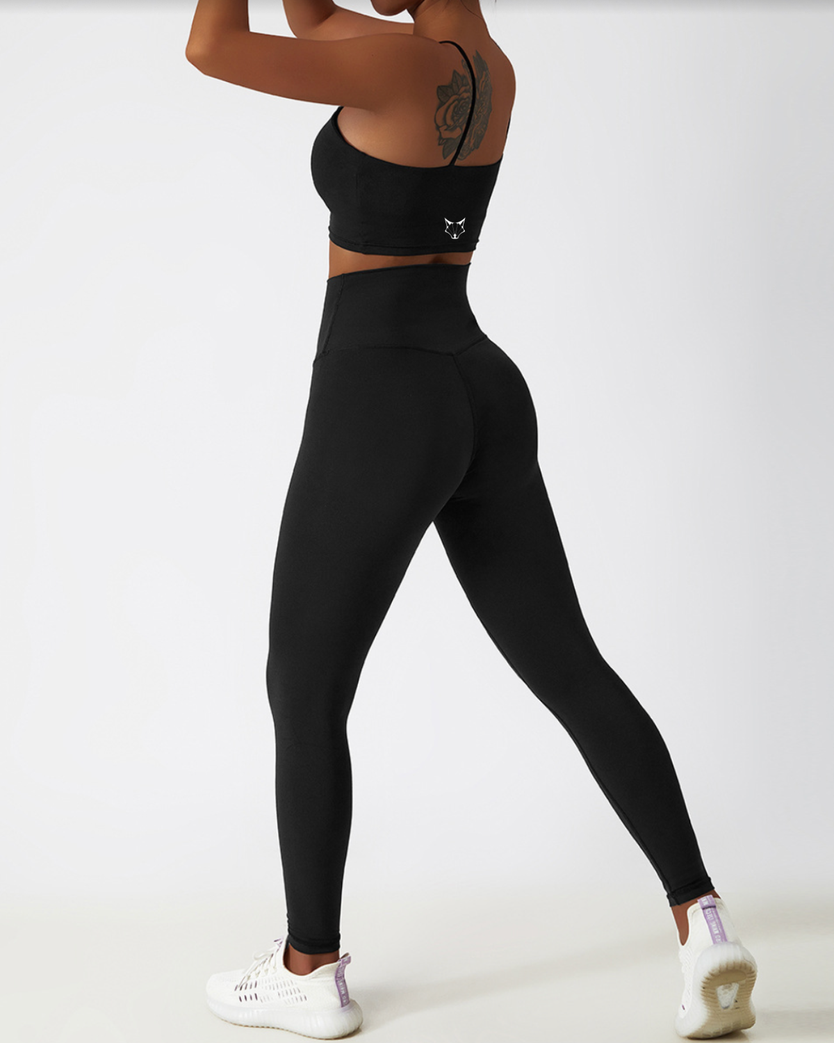 ESSENTIALS ONE STRAP TOP