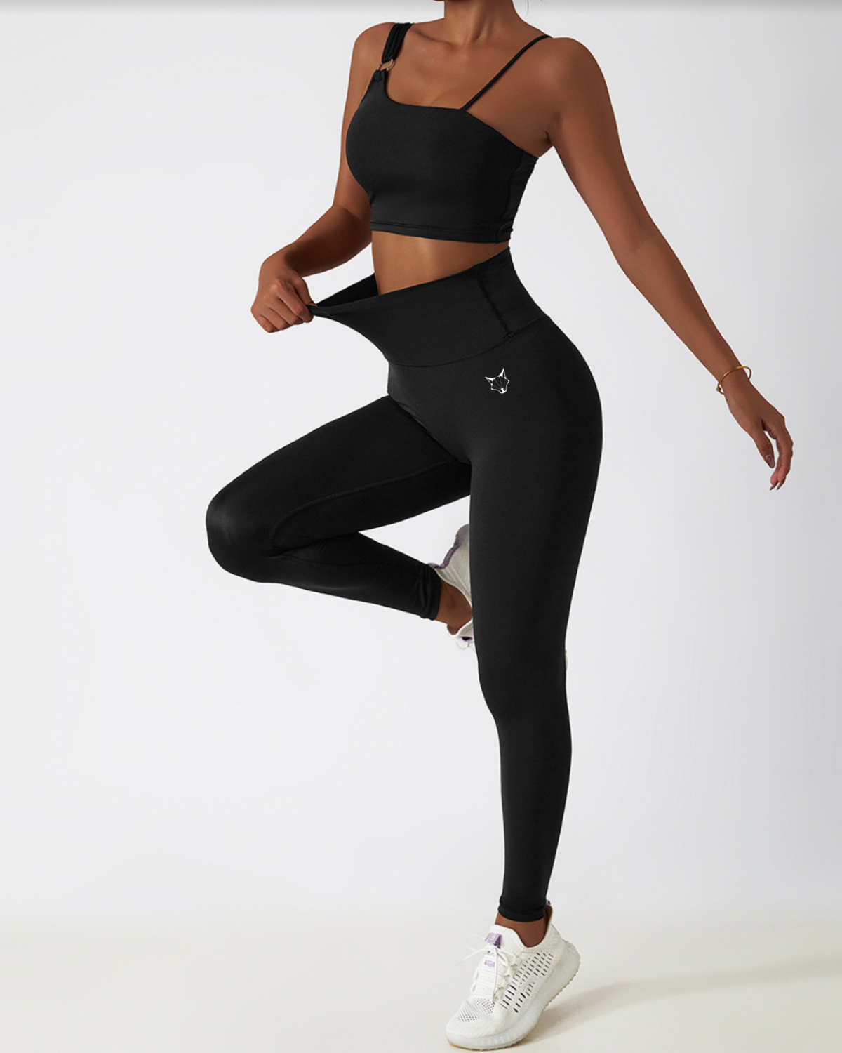 ESSENTIALS ONE STRAP TOP