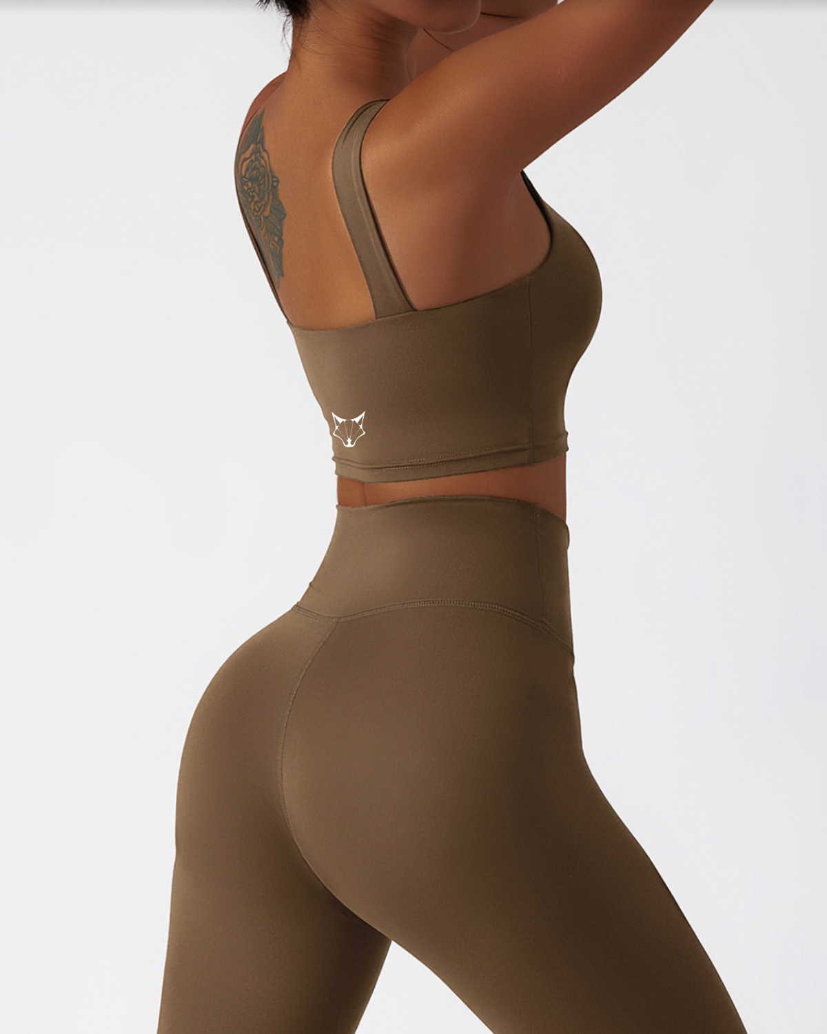 ESSENTIALS ONE STRAP TOP