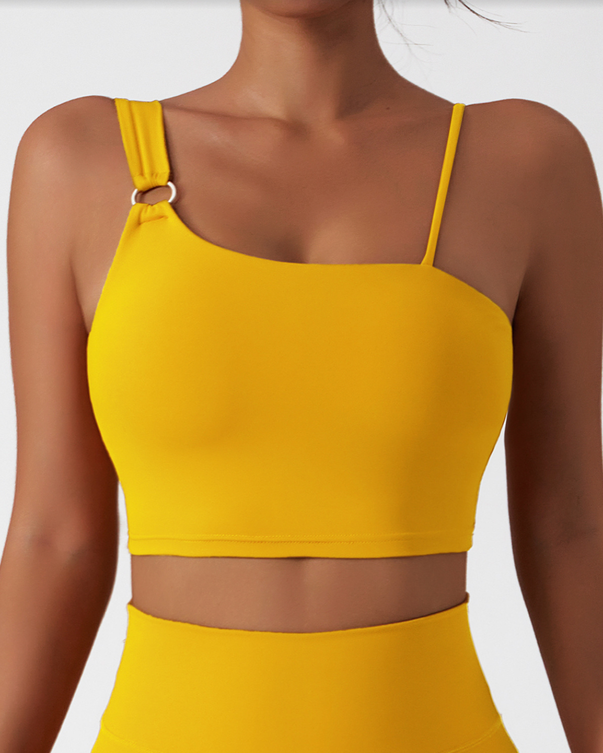 ESSENTIALS ONE STRAP TOP