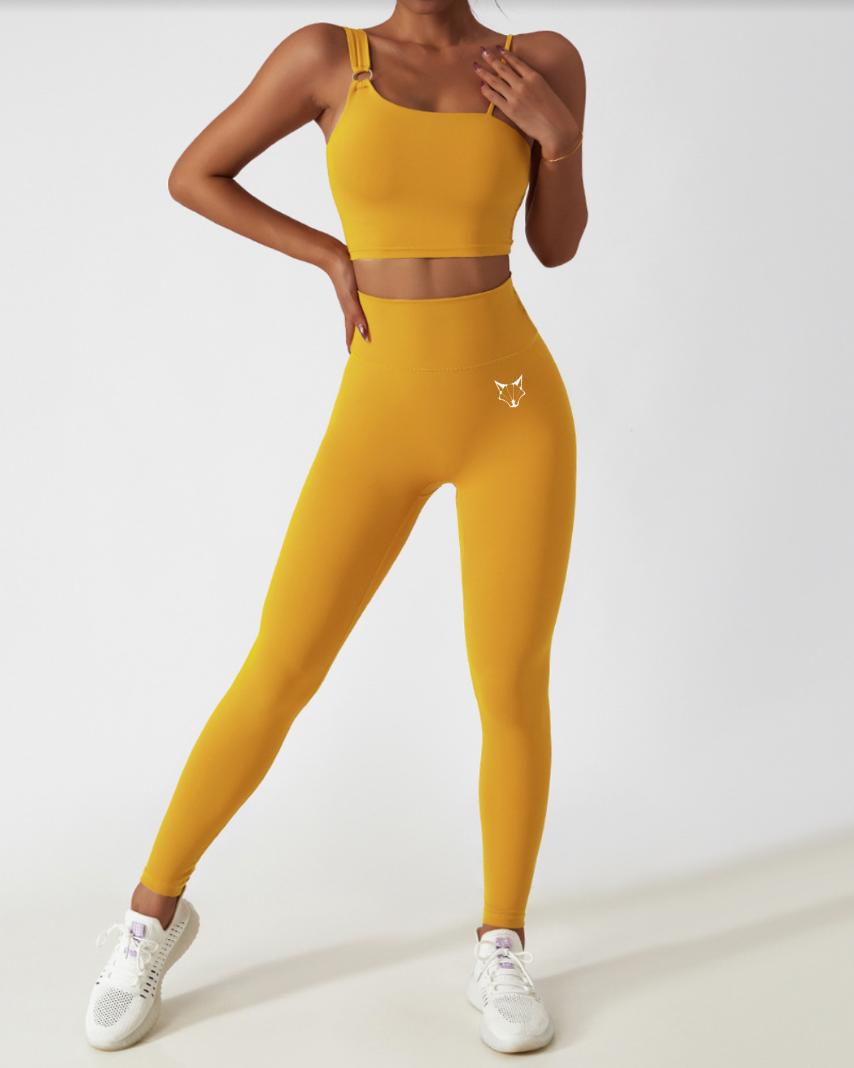 ESSENTIALS ONE STRAP TOP