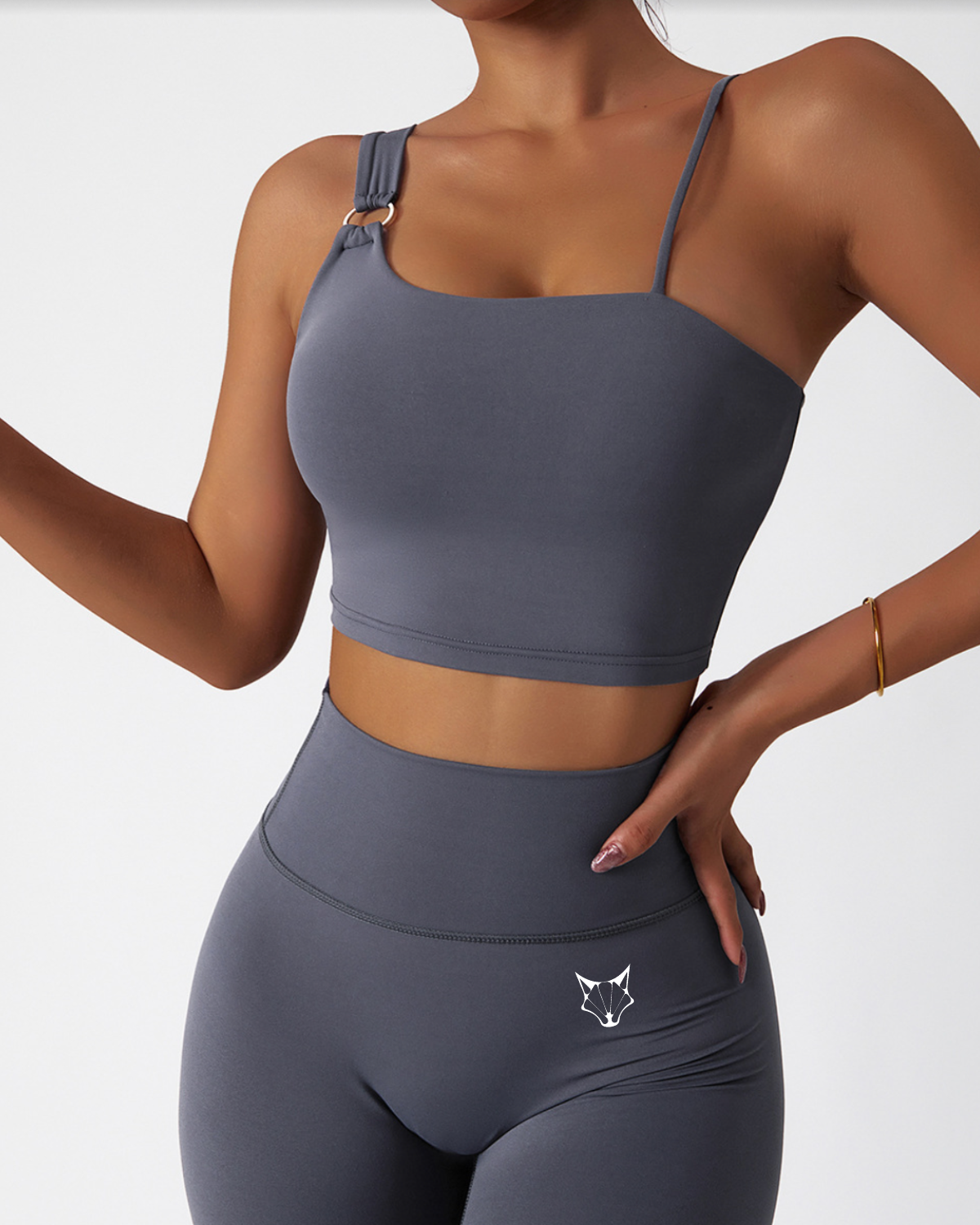 ESSENTIALS ONE STRAP TOP