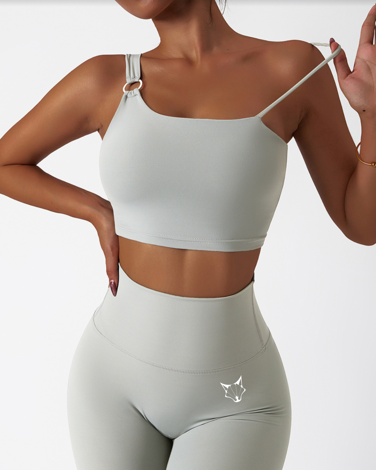 ESSENTIALS ONE STRAP TOP